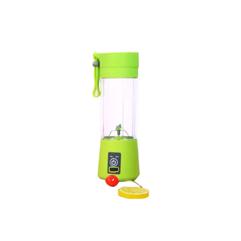 Pink mini USB electric fruit juicer with carrying rope on a kitchen countertop.