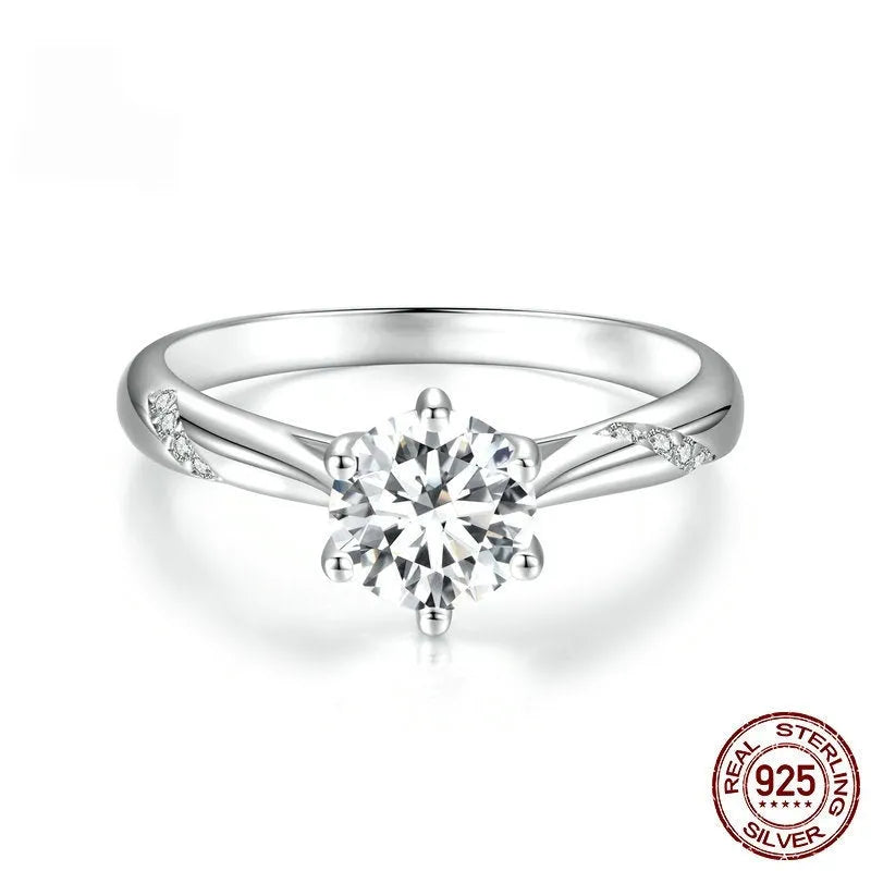 Silver moissanite ring with 1 karat main stone, electroplated finish, size US7 on a white background.