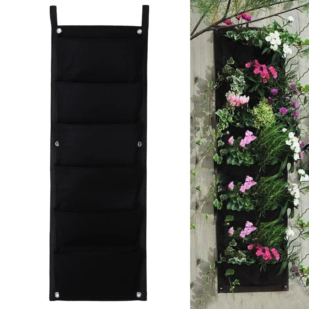 Vertical wall garden hanging planter with multiple planting pockets for herbs and flowers