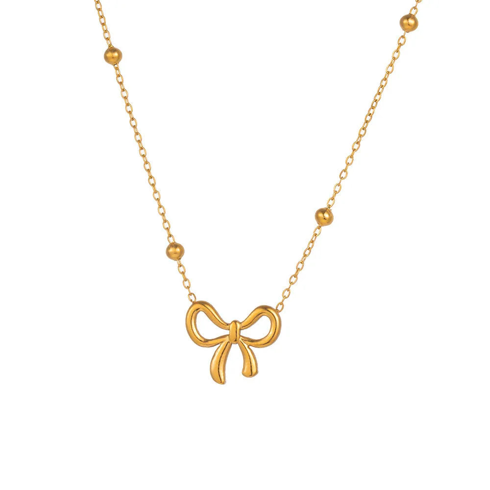 Gold bow necklace with adjustable chain on titanium steel with electroplated finish