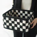 Grey checkerboard patterned felt storage basket with folded sides, showing its 37cm length.