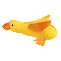 Yellow teddy dog training toy with integrated duck doll and food leak design for scent work