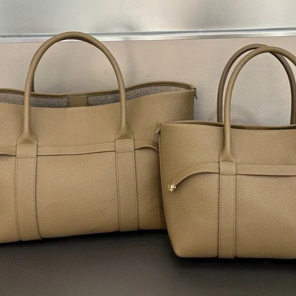 Women's genuine leather single shoulder handbag in horizontal square shape with stitching detail