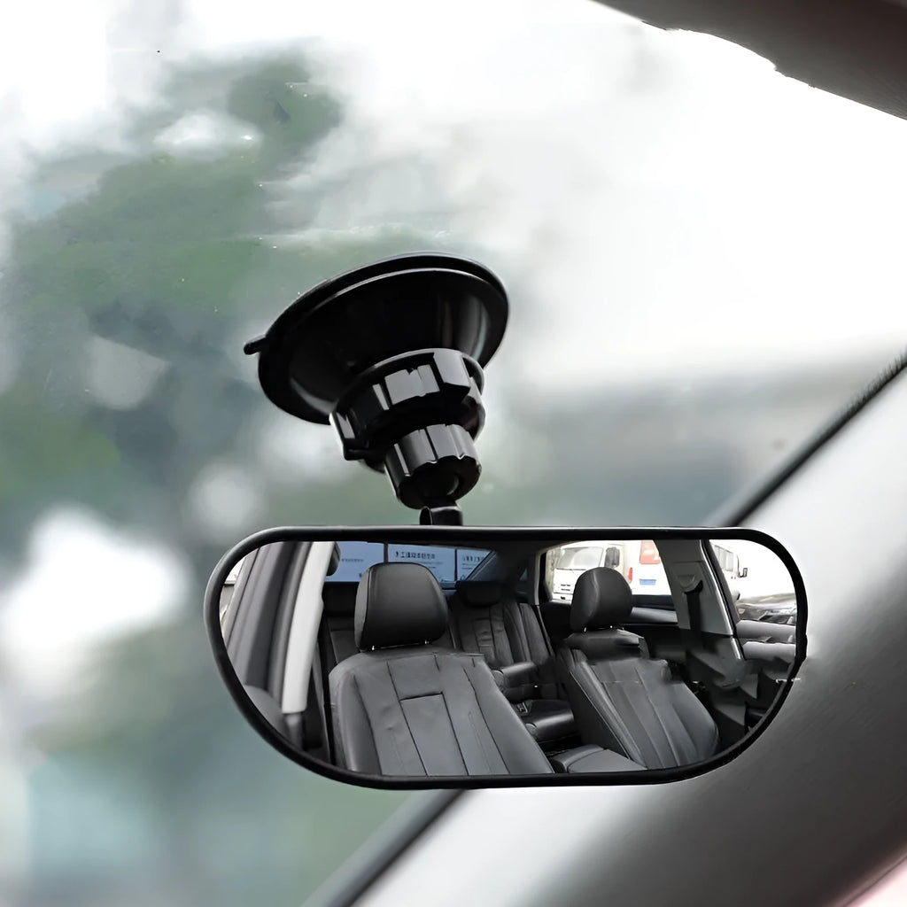 Black 360-degree rotating car rearview mirror with sucker attachment on windscreen