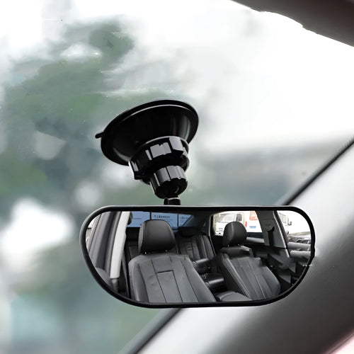 Black 360-degree rotating car rearview mirror with sucker attachment on windscreen