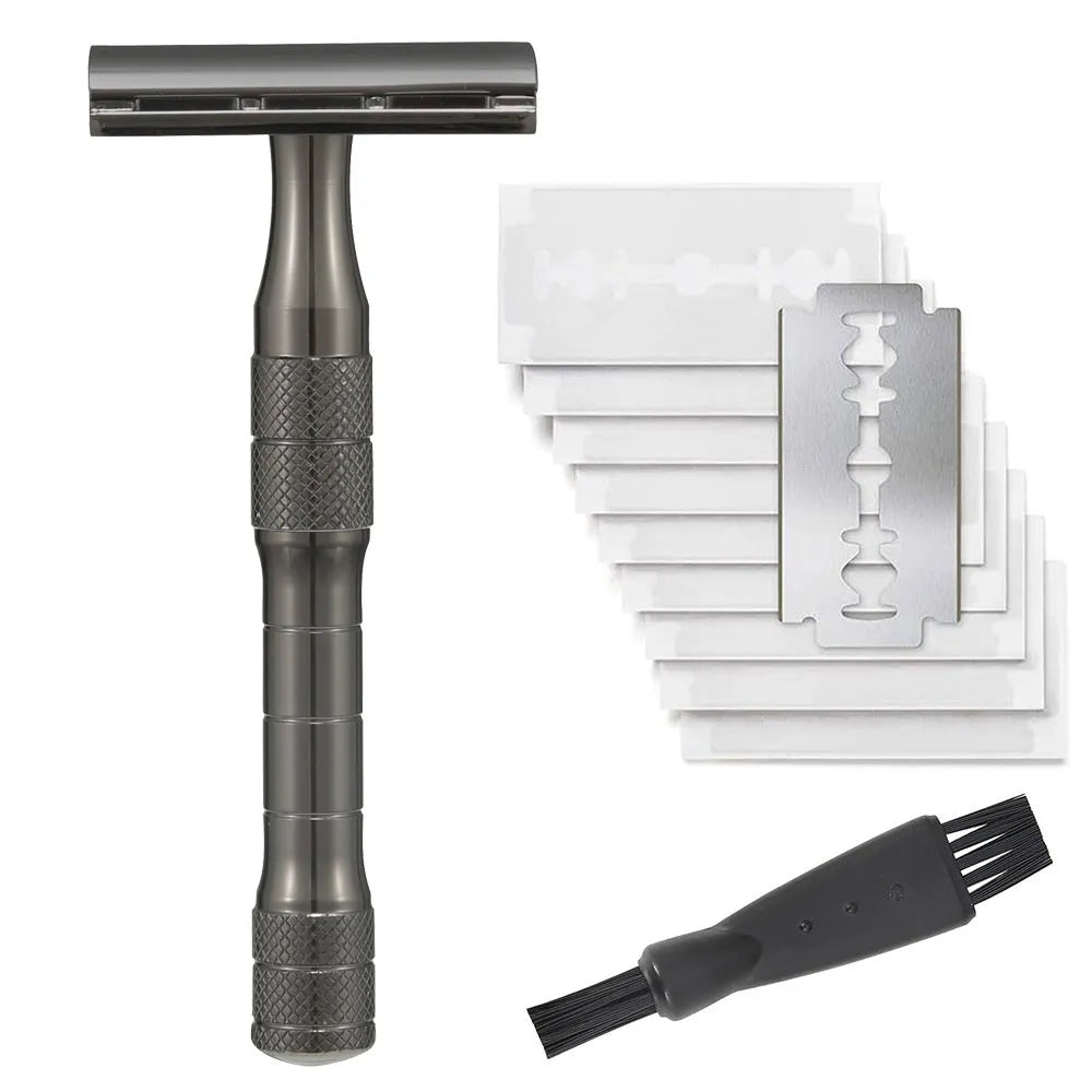 Manual double-sided safety razor with alloy handle, shown with replacement blades on a towel.