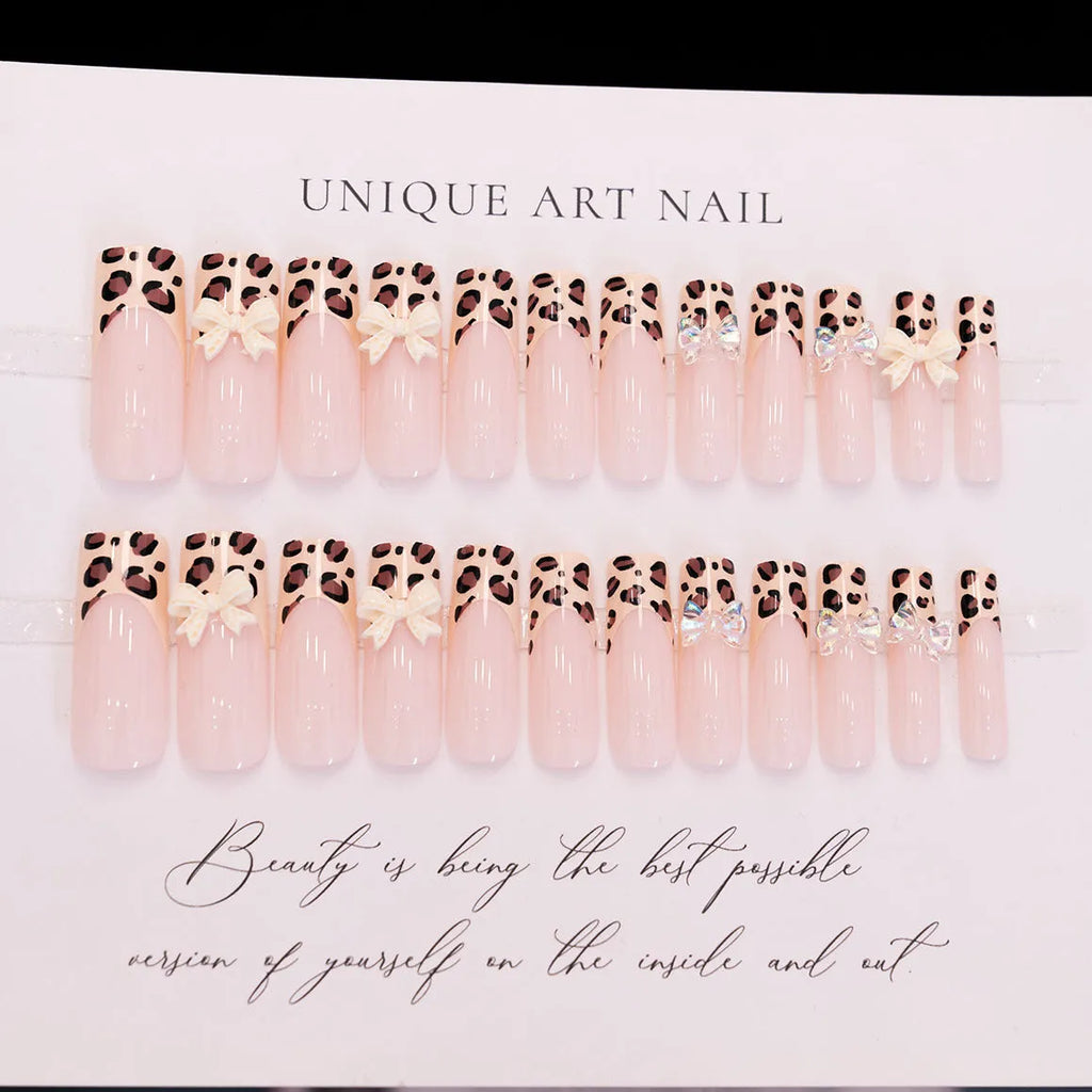 Leopard print butterfly design plastic nail art pieces in colour WM296