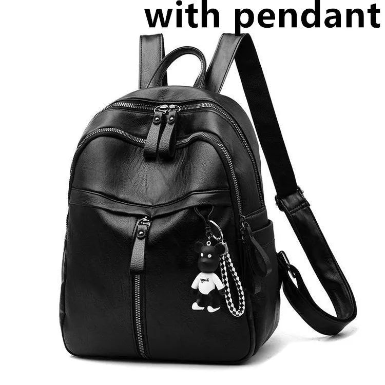 Black pu leather backpack with double straps showing soft surface texture and medium size profile