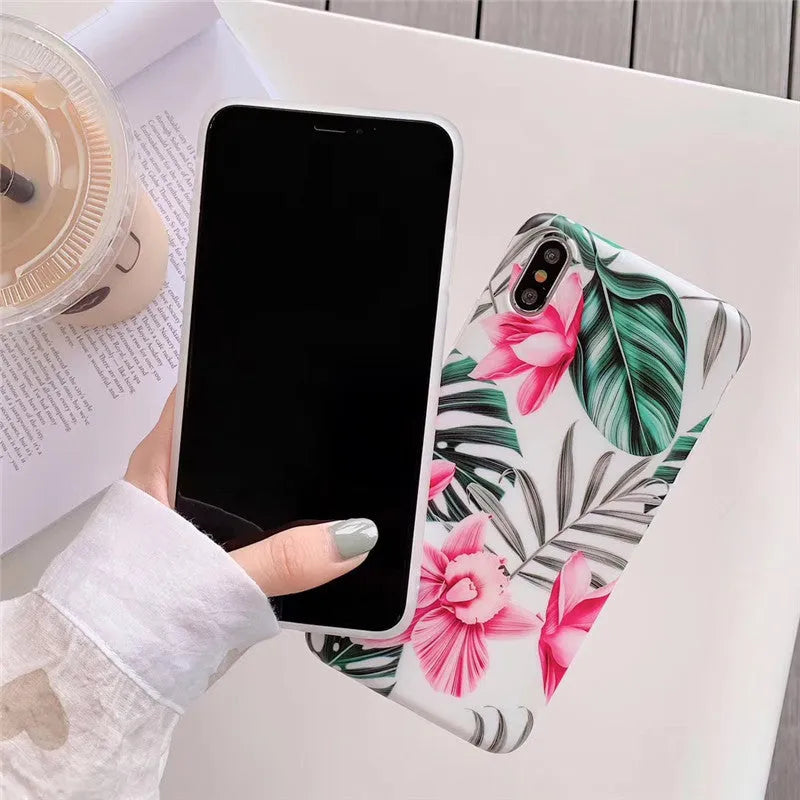 Pink floral pattern on a flexible TPU back cover case for iPhone.