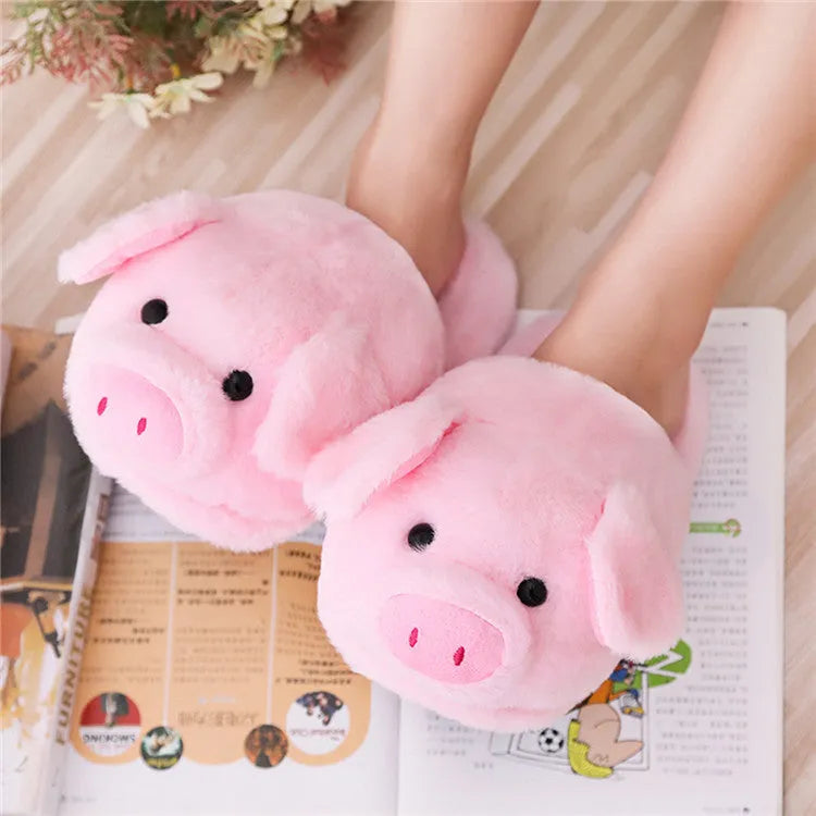 Pink pig plush floor slippers with soft short plush material and PP cotton filling.