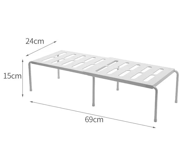 White telescopic kitchen rack with adjustable height showing extended and compressed positions