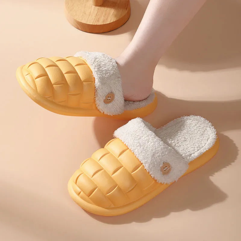 Plaid detachable slippers for women with plush lining and EVA sole in pink, shown on a wooden floor.