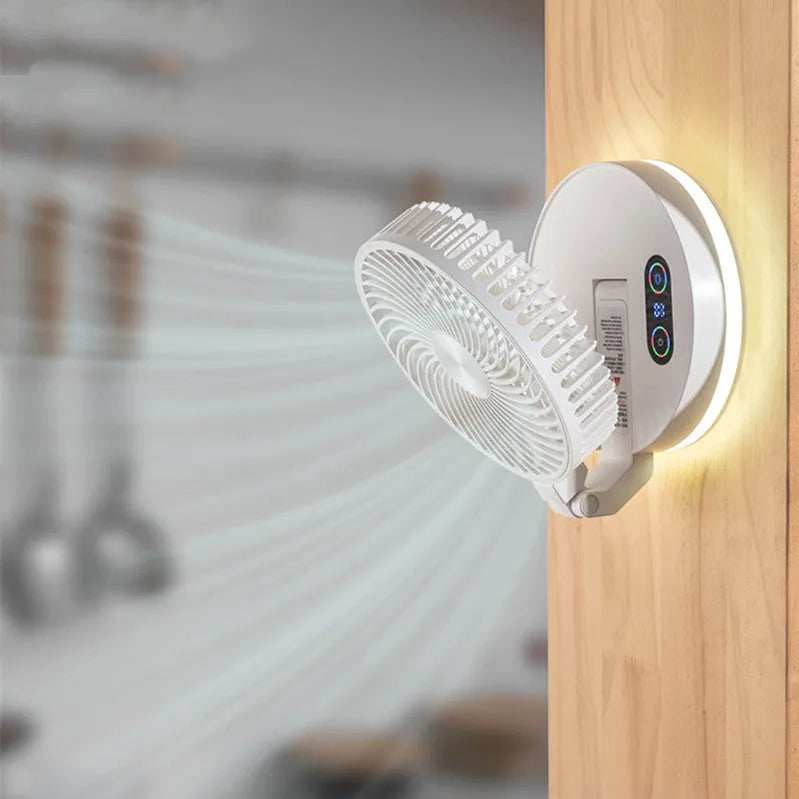 White folding USB rechargeable fan with 7 blades and remote control placed on a table
