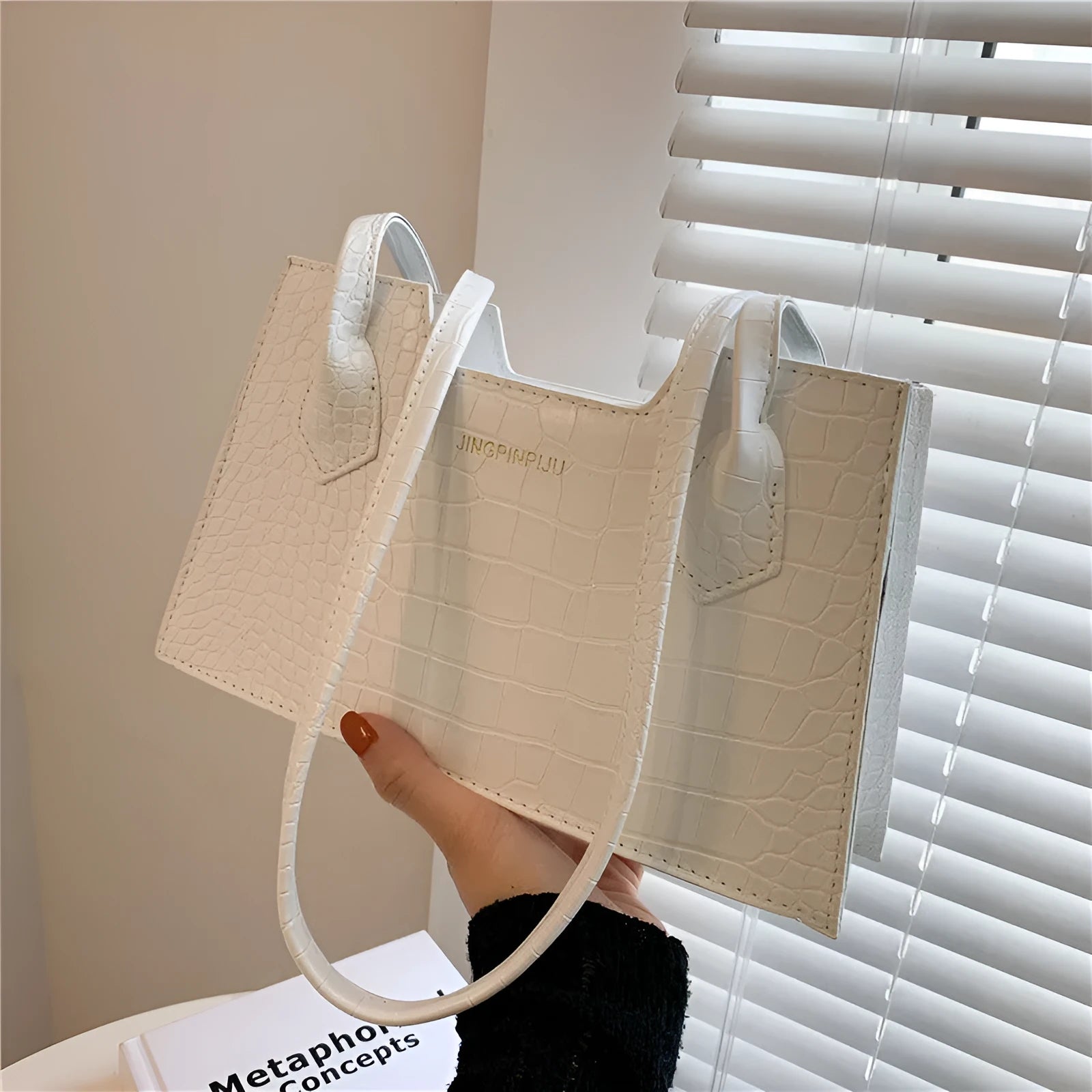 Small square PU handbag with crocodile pattern, sewing line detail, medium hard build, 27x16x7cm, black colour