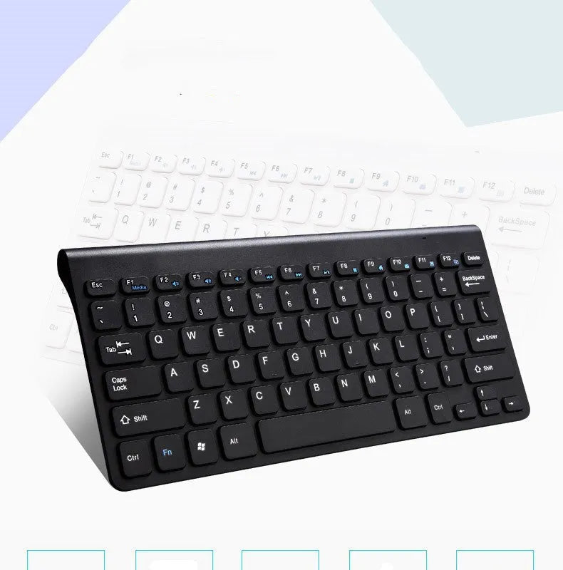 Black wireless keyboard and mouse set with 4G USB receiver on wooden desk