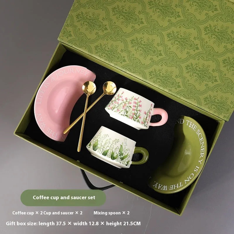 Ceramic coffee cup set with two 300ml cups, saucers, and spoons in couple designs
