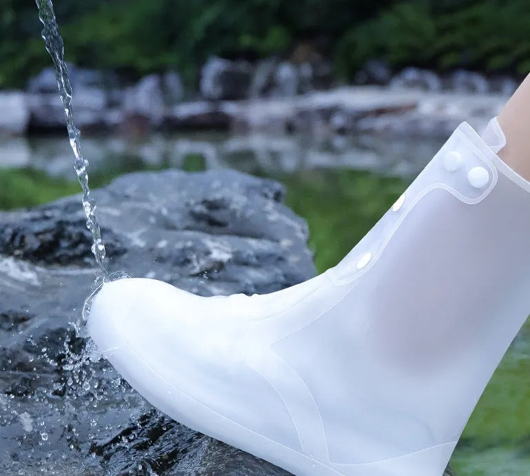 White PVC women's reusable waterproof shoe covers with high top design