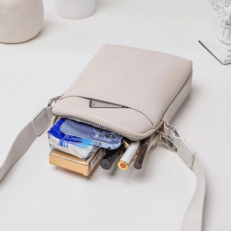 Solid colour mobile phone crossbody bag for women in black, beige, khaki, or green.