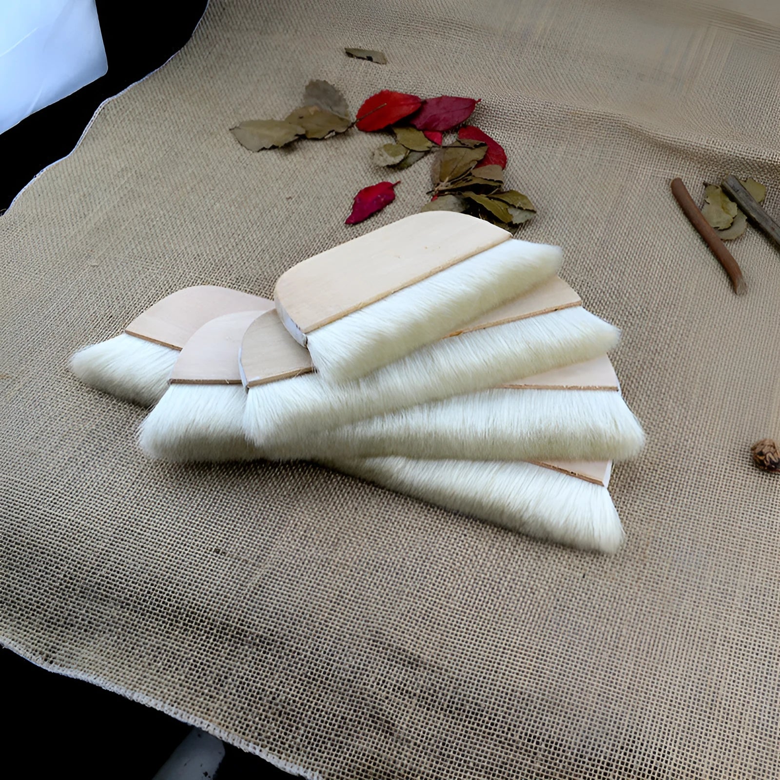 Natural wool brush for art mounting and shading craft projects in four size options.