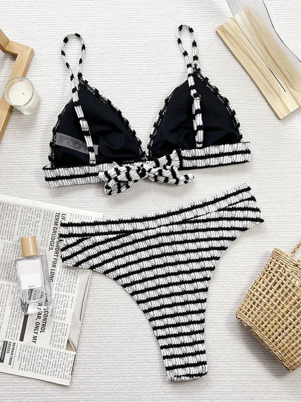 Women's black and white contrast colour separated bikini set with solid pattern and briefs