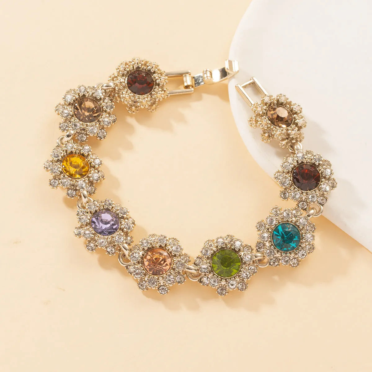 Colorful rhinestone necklace, earrings, and bracelet set on display, electroplated zinc alloy, geometric pendant