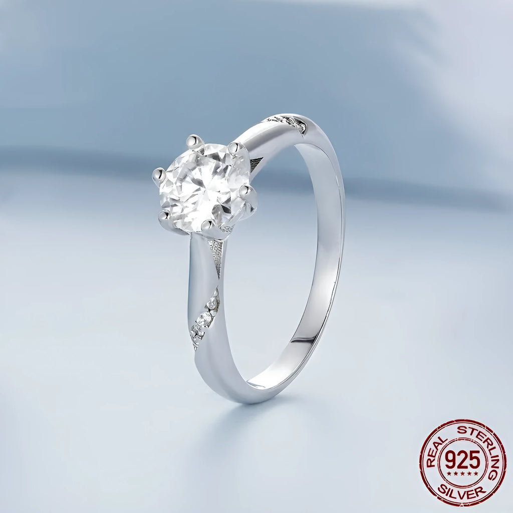 Silver moissanite ring with 1 karat main stone, electroplated finish, size US7 on a white background.