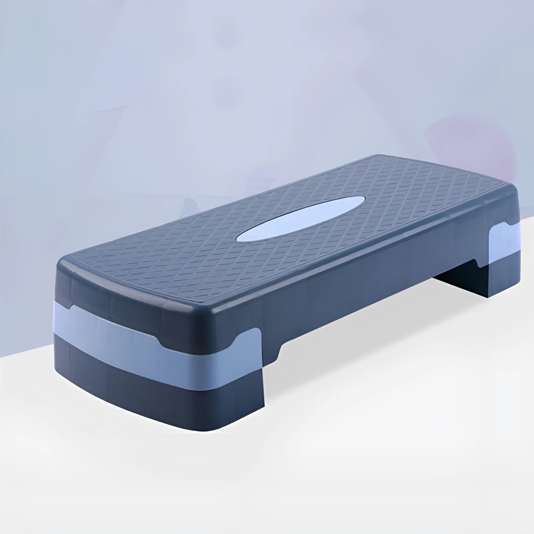 Grey Fit Step aerobic platform on a wood floor, showing its 68cm length and 15cm height.
