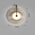 Round glass wall lamp in gold finish with glass shade and iron body for bedside or aisle lighting
