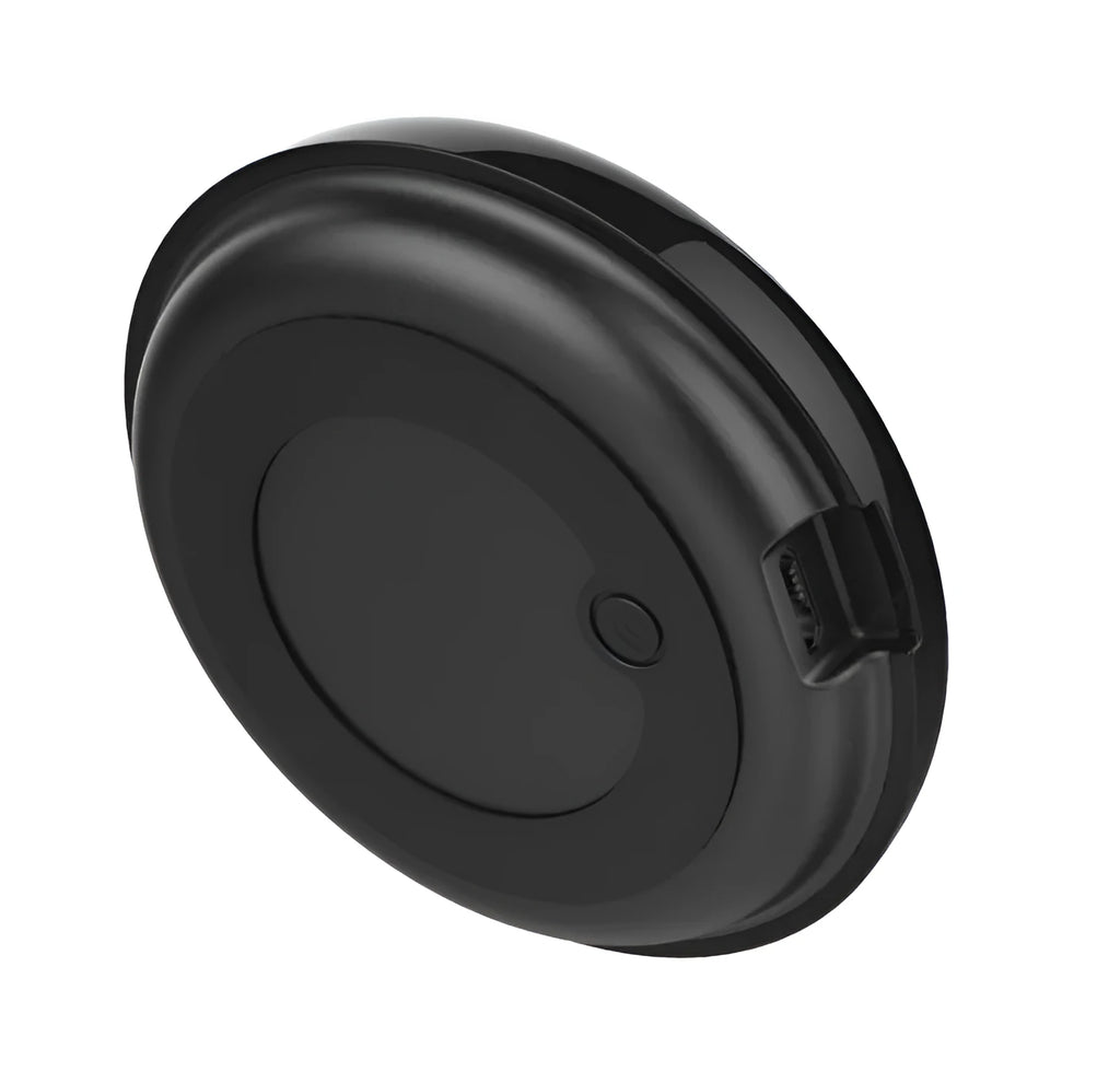 Black compact WiFi infrared universal remote control on a table, 67x67x19.5 mm, with 360° multi-directional IR