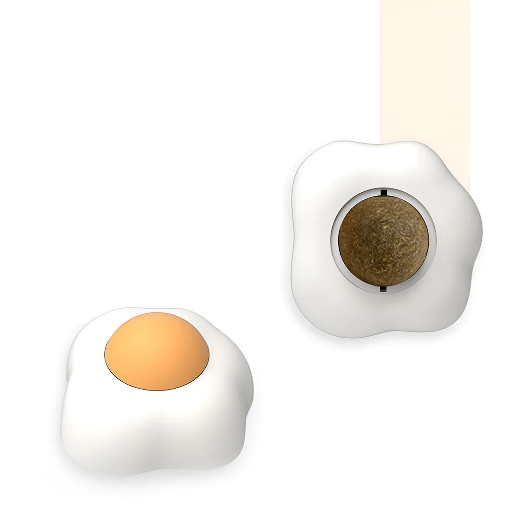 Soft plush catnip ball toy in fried egg and poached egg shapes for wall-mounted cat play