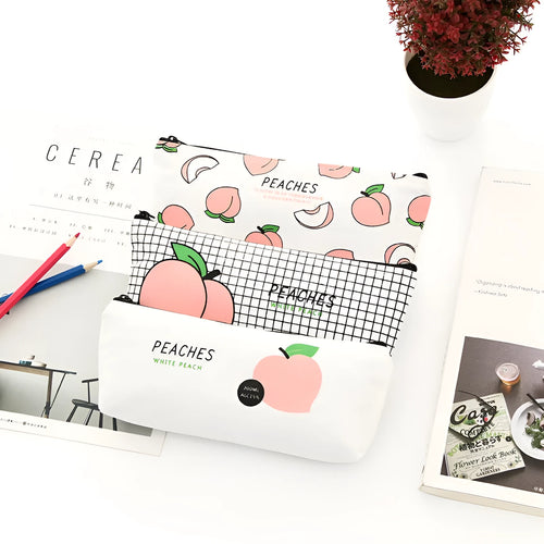 Rectangular canvas pen bag in peach print pattern, 20 by 8.5 centimetres, on a flat surface.