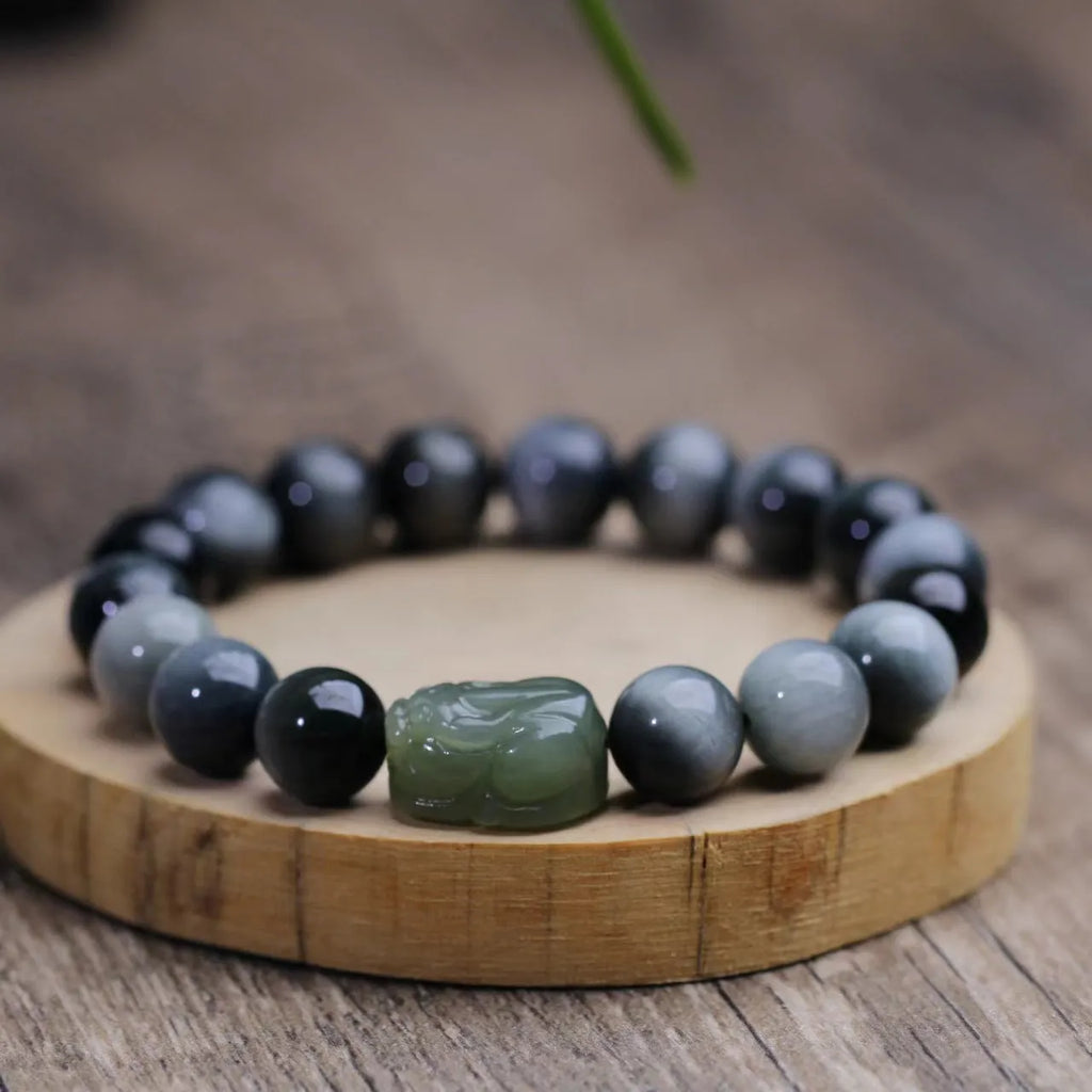 Black 10mm eagle eye stone and Hetian jade Pixiu bracelet with manual craftsmanship details