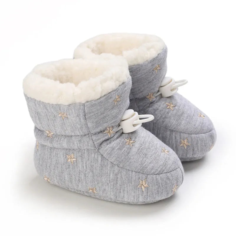 Thickened cotton baby shoes for autumn winter with non-slip sole and elastic band in black white, dark blue, gray, and pink