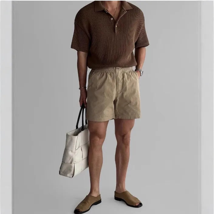 Cotton loose fit sports shorts in black, white, and khaki colours for summer athletic wear