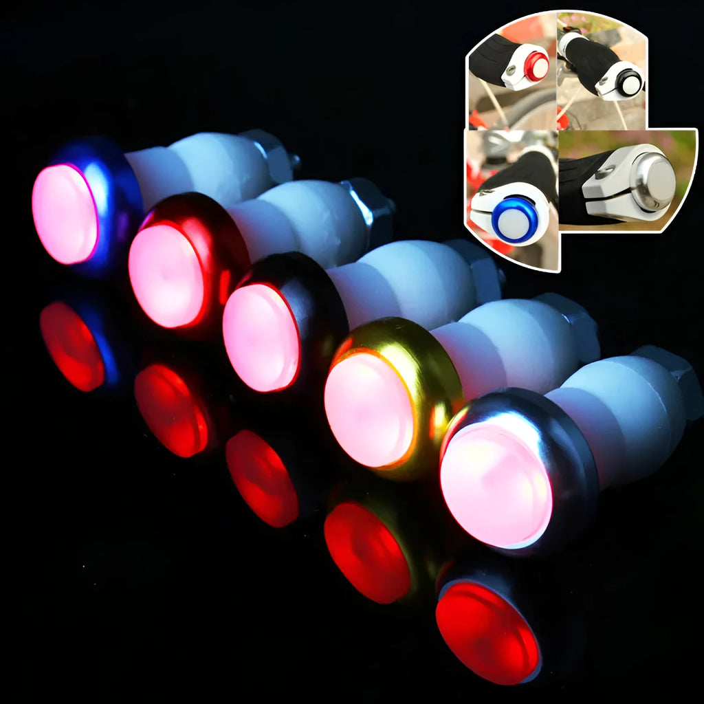A pair of anodised aluminium bicycle handlebar safety lights in a choice of colours, showing the LED lens and mounting nut.