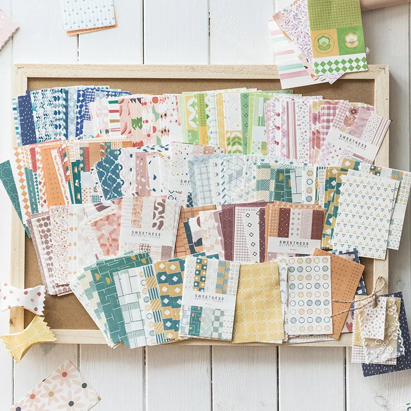Pack of 50 retro collage material note papers in dessert colours like red plum and caramel, each sheet 56mm by 83mm.