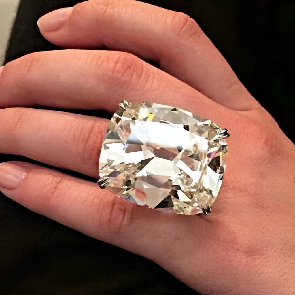 Women's geometric square diamond ring with white gold colour finish on a hand