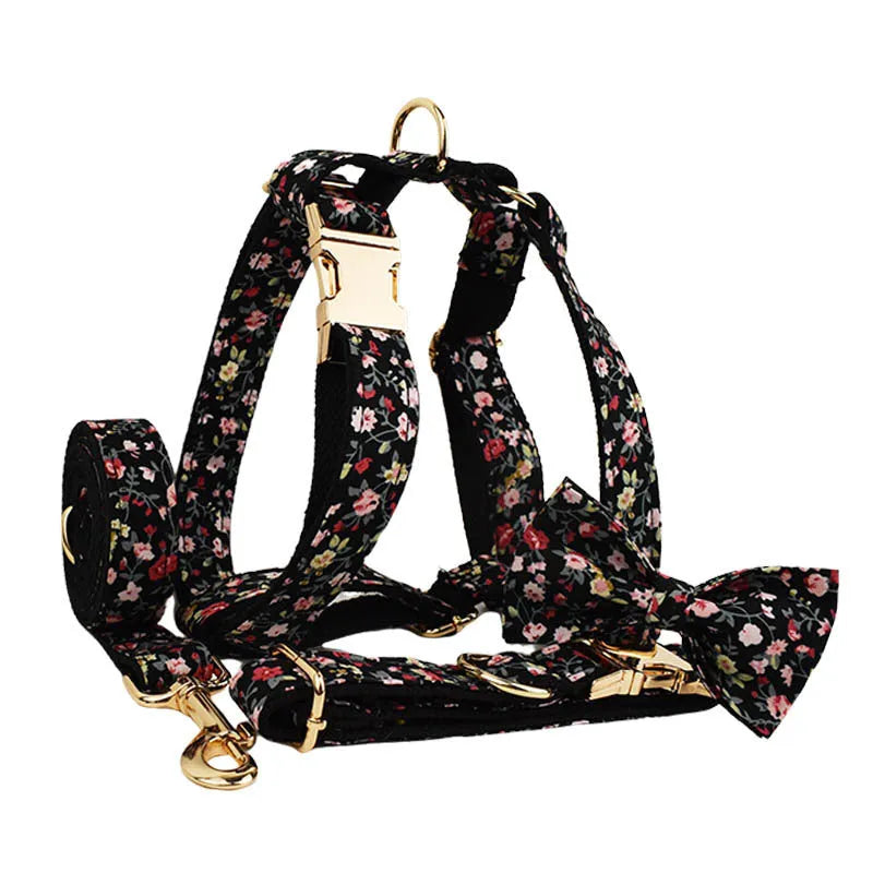 Cloth dog collar set with removable bow, printed lettering, matching leash, and vest in assorted colours