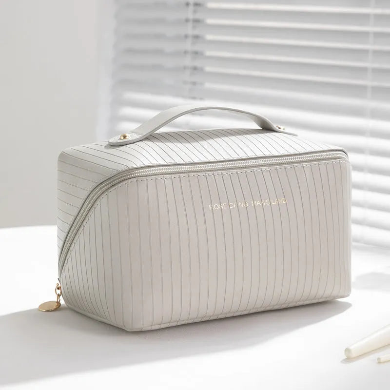 Vertical pattern pillow makeup bag in cubic shape measuring 22.5cm