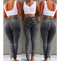 Women's fringed jeans in cowboy denim with frayed hem detail in dark blue, grey, and light blue colours