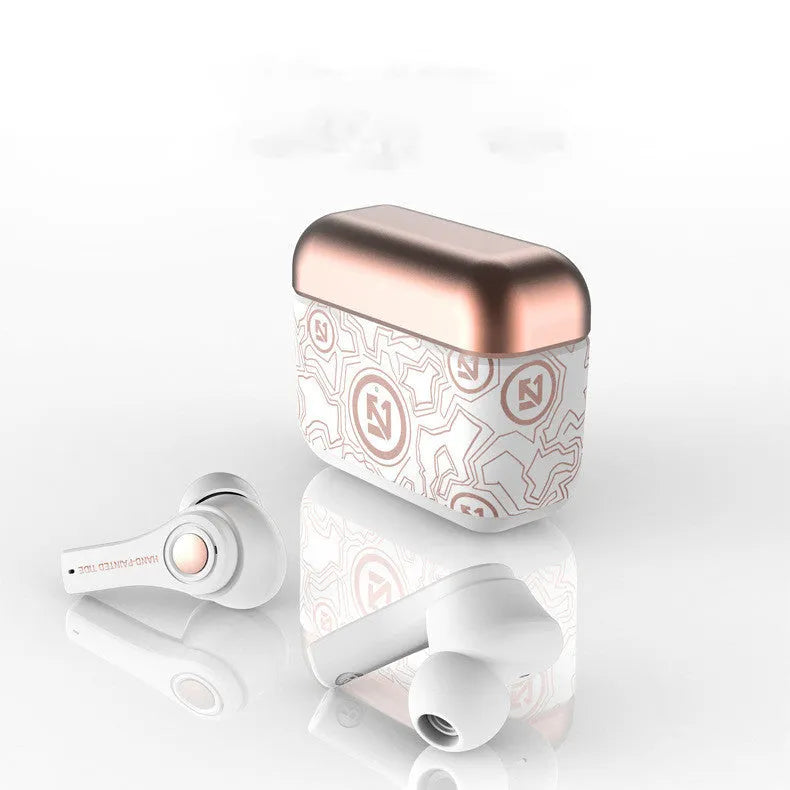 Black and white TWS touch in-ear wireless headphones with a charging case on a table.