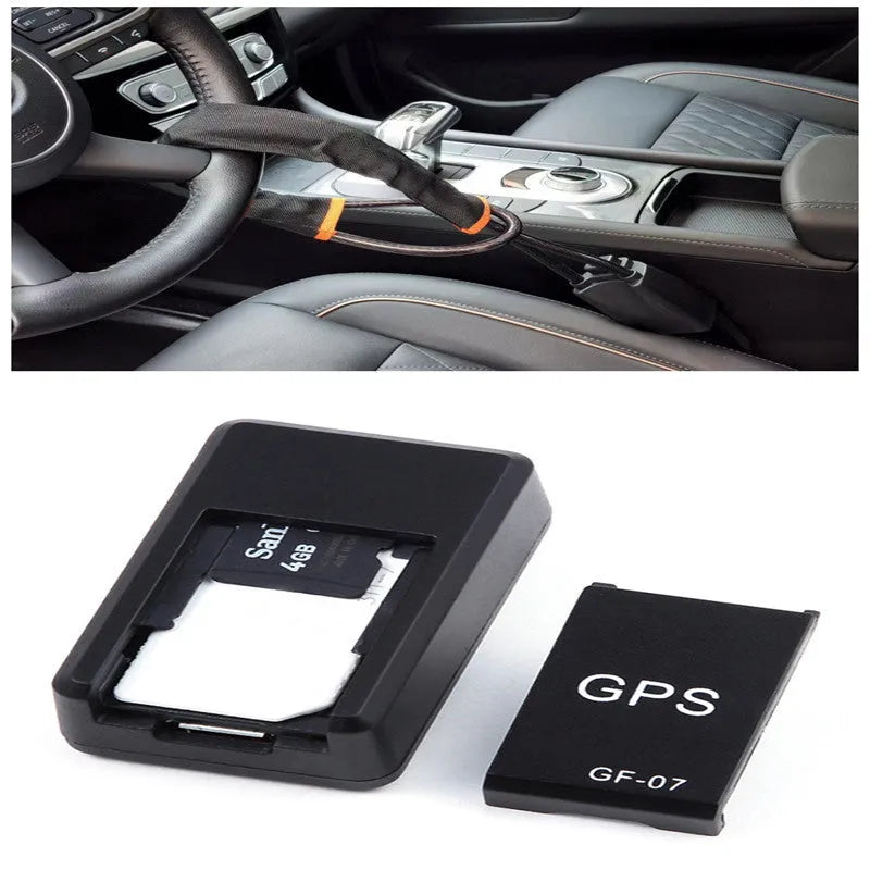 Small black plastic magnetic GPS tracker device next to a USB charging cable.