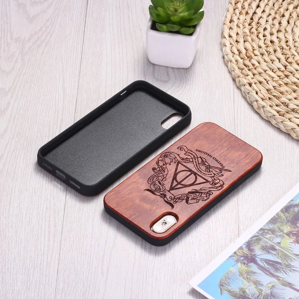 Wooden phone case with TPU frame showing laser-carved wood back and protective edges