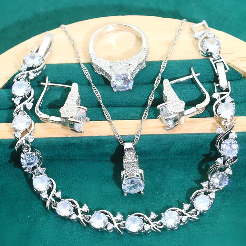 Bridal zircon alloy jewellery four-piece set showing necklace, earrings, ring and bracelet on water wave chain