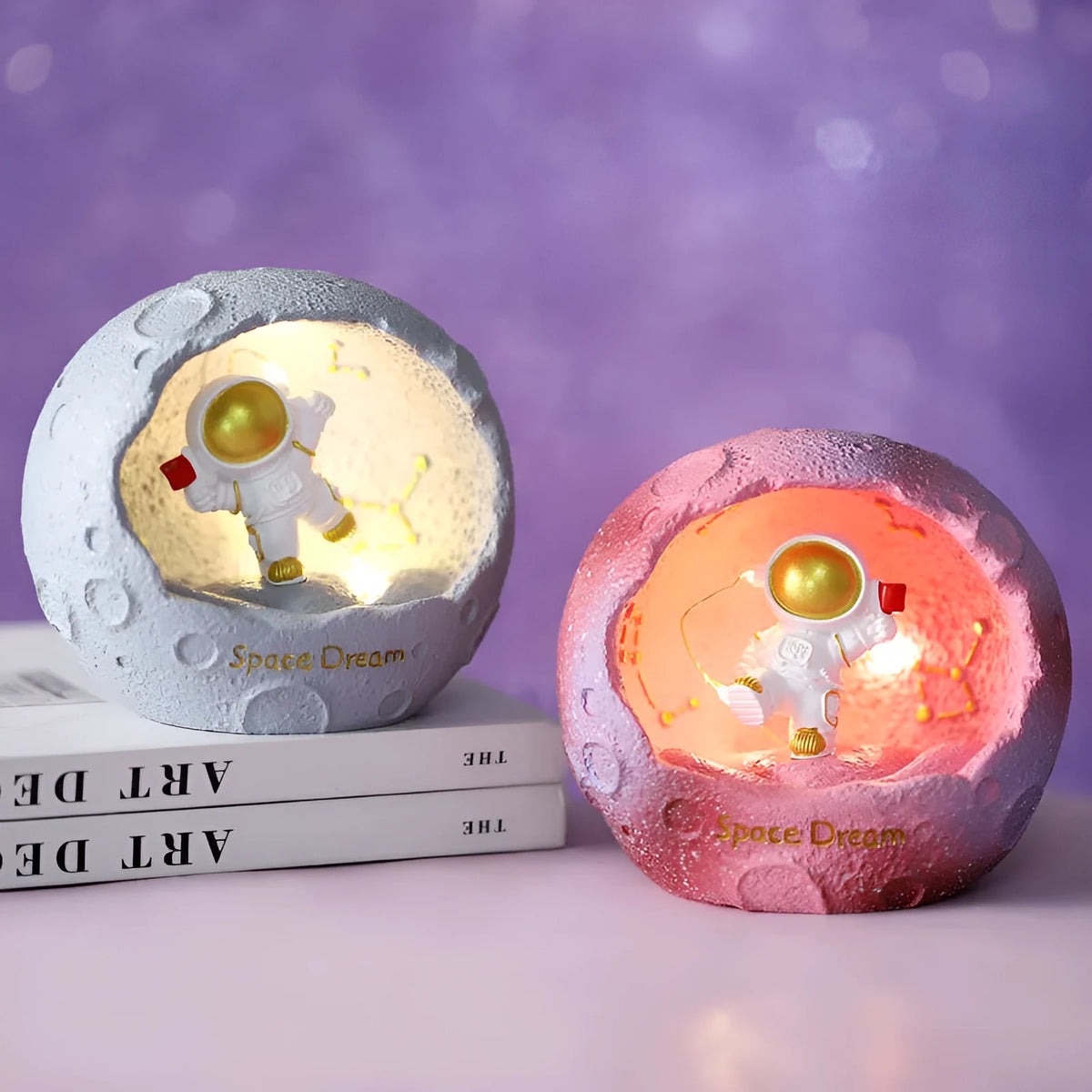 Cartoon spaceman resin night light ornament on a bedroom table with built-in battery