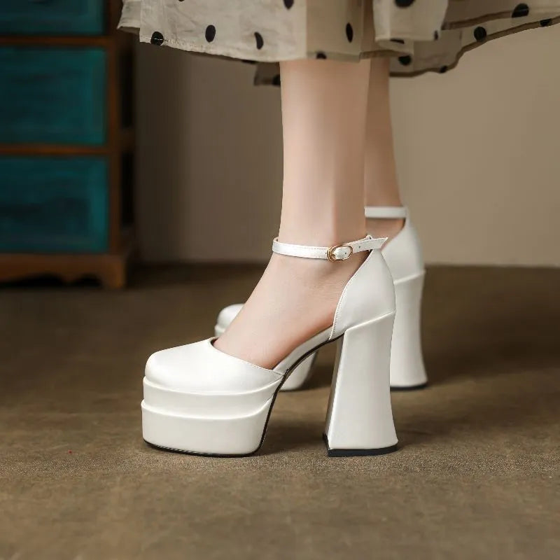 Women's white platform high heels with a chunky heel, round toe, and waterproof PU upper.