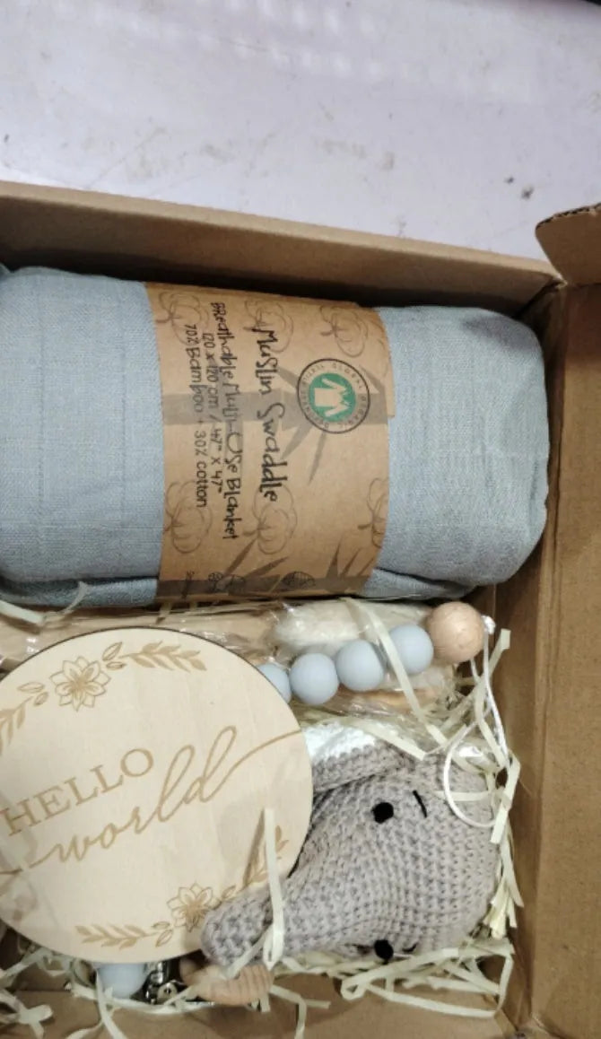 Baby teething toy gift set with bamboo cotton blanket and natural beech wood components