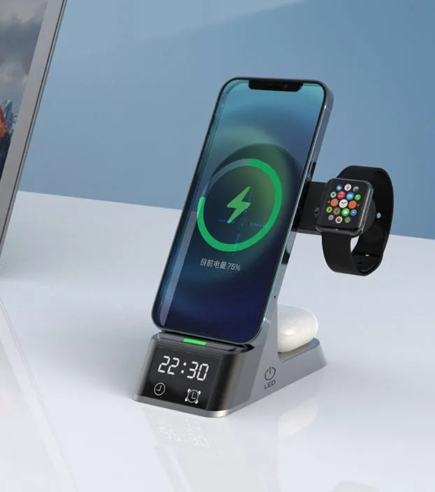 Black multifunctional alarm clock with wireless charging pad, Apple Watch dock, and USB-A port on bedside table.