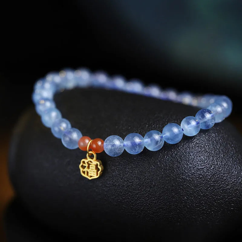 Women's ice translucent aquamarine crystal bracelet with 8mm round beads and blessing card detail