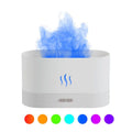 Ultrasonic aroma diffuser with flame light, black, 75x75x137mm, on wooden table with mist
